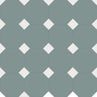 Classic Victorian-style floor tile pattern featuring sage green octagons with small, alternating super white square inserts at each corner, forming a traditional octagon-and-dot design. 