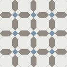 Victorian tile pattern with white octagons, grey connecting hexagons, and blue diamond accents in a geometric grid.   