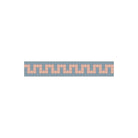 Greek Key Art Deco tile border with interwoven right-angled spirals and a pink wave motif on a muted blue-grey background.