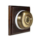 Switch to Wood's Dolly Light Switch Smooth Dome - 1 Gang Square Backplate Antique Brass in Dark Oak