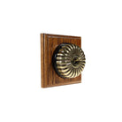 Switch to Wood's Dolly Light Switch Fluted Dome - 1 Gang Square Backplate Antique Brass in Medium Oak 
