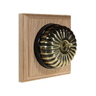 Switch to Wood's Dolly Light Switch Fluted Dome - 1 Gang Square Backplate Antique Brass in Unfinished Oak