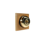 Switch to Wood's Dolly Light Switch Smooth Dome - 1 Gang Square Backplate Polished Brass in Light Oak