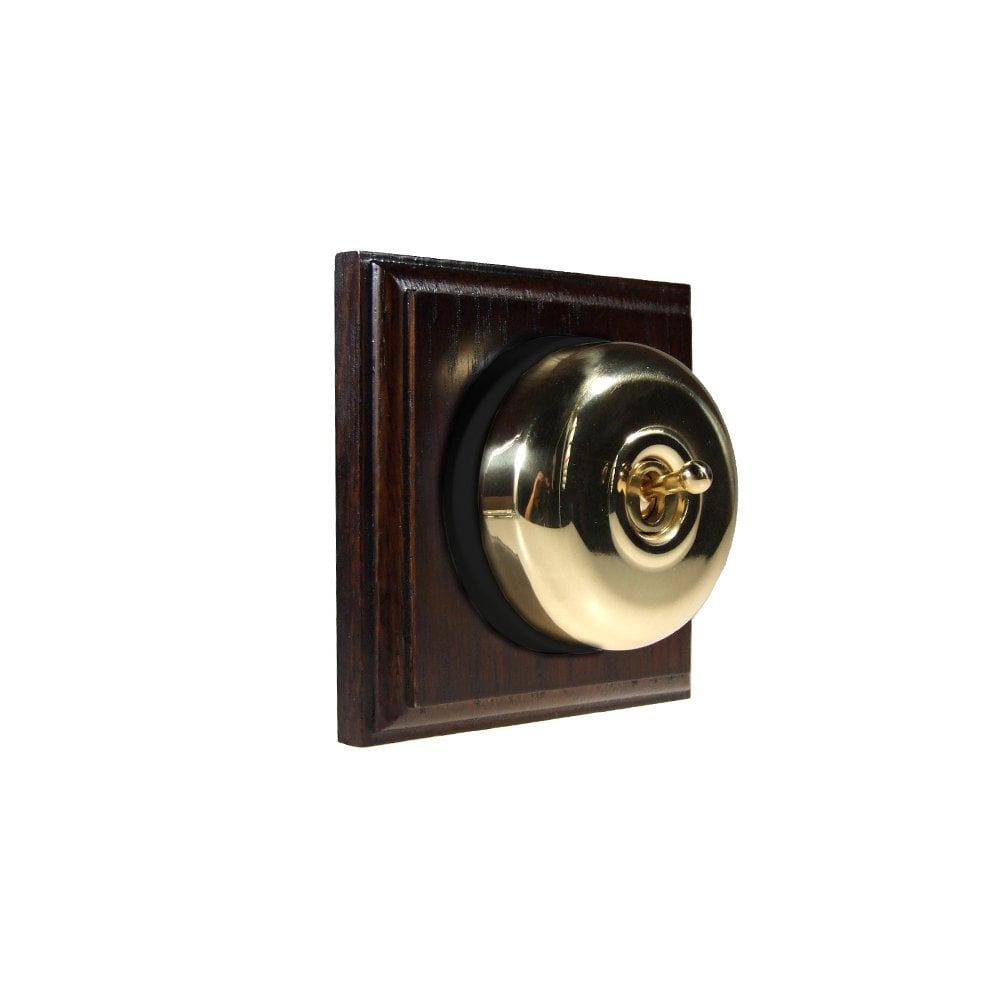 Switch to Wood's Dolly Light Switch Smooth Dome - 1 Gang Square Backplate Polished Brass in Dark Oak