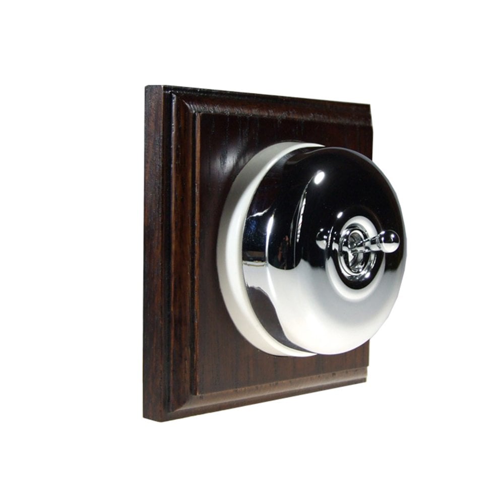 Switch to Wood's Dolly Light Switch Smooth Dome - 1 Gang Square Backplate Polished Chrome in Dark Oak