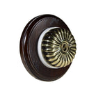 Switch to Wood's Dolly Light Switch Fluted Dome - 1 Gang Round Backplate Antique Brass in Dark Oak