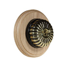 Switch to Wood's Dolly Light Switch Fluted Dome - 1 Gang Round Backplate Antique Brass in Unfinished Oak