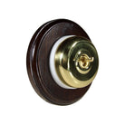 Switch to Wood's Dolly Light Switch Smooth Dome - 1 Gang Round Backplate Polished Brass in Dark Oak