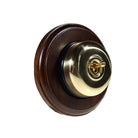 Switch to Wood's Dolly Light Switch Smooth Dome - 1 Gang Round Backplate Polished Brass in Dark Oak