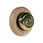 Switch to Wood's Dolly Light Switch Smooth Dome - 1 Gang Round Backplate Polished Brass in Unfinished Oak