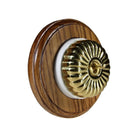 Switch to Wood's Dolly Light Switch Fluted Dome - 1 Gang Round Backplate Polished Brass in Medium Oak 