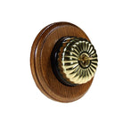 Switch to Wood's Dolly Light Switch Fluted Dome - 1 Gang Round Backplate Polished Brass in Medium Oak 