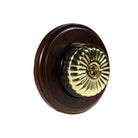 Switch to Wood's Dolly Light Switch Fluted Dome - 1 Gang Round Backplate Polished Brass in Dark Oak