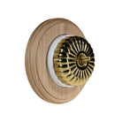 Switch to Wood's Dolly Light Switch Fluted Dome - 1 Gang Round Backplate Polished Brass in Unfinished Oak