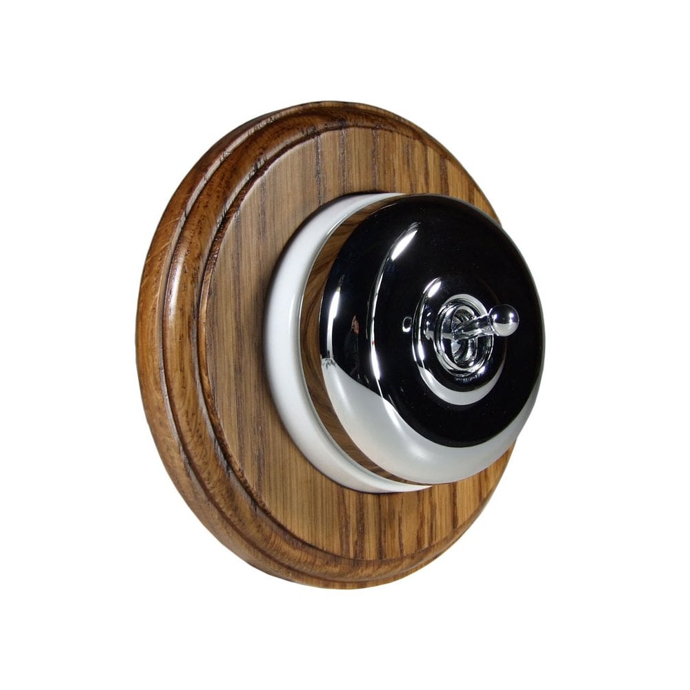 Switch to Wood's Dolly Light Switch Smooth Dome - 1 Gang Round Backplate Polished Chrome in Medium Oak 