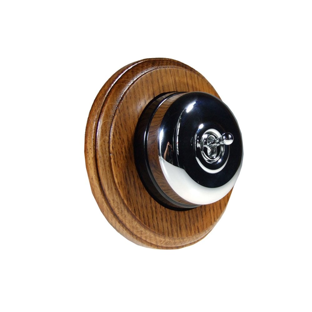 Switch to Wood's Dolly Light Switch Smooth Dome - 1 Gang Round Backplate Polished Chrome in Medium Oak 