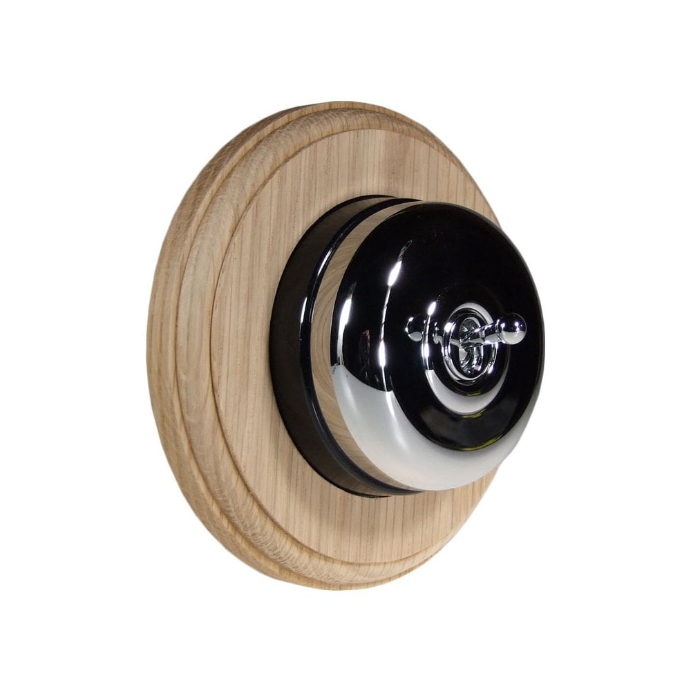 Switch to Wood's Dolly Light Switch Smooth Dome - 1 Gang Round Backplate Polished Chrome in Unfinished Oak
