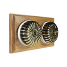 Switch to Wood's Dolly Light Switch Fluted Dome - 2 Gang Horizontal Antique Brass in Light Oak