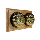 Switch to Wood's Dolly Light Switch Fluted Dome - 2 Gang Horizontal Polished Brass in Light Oak