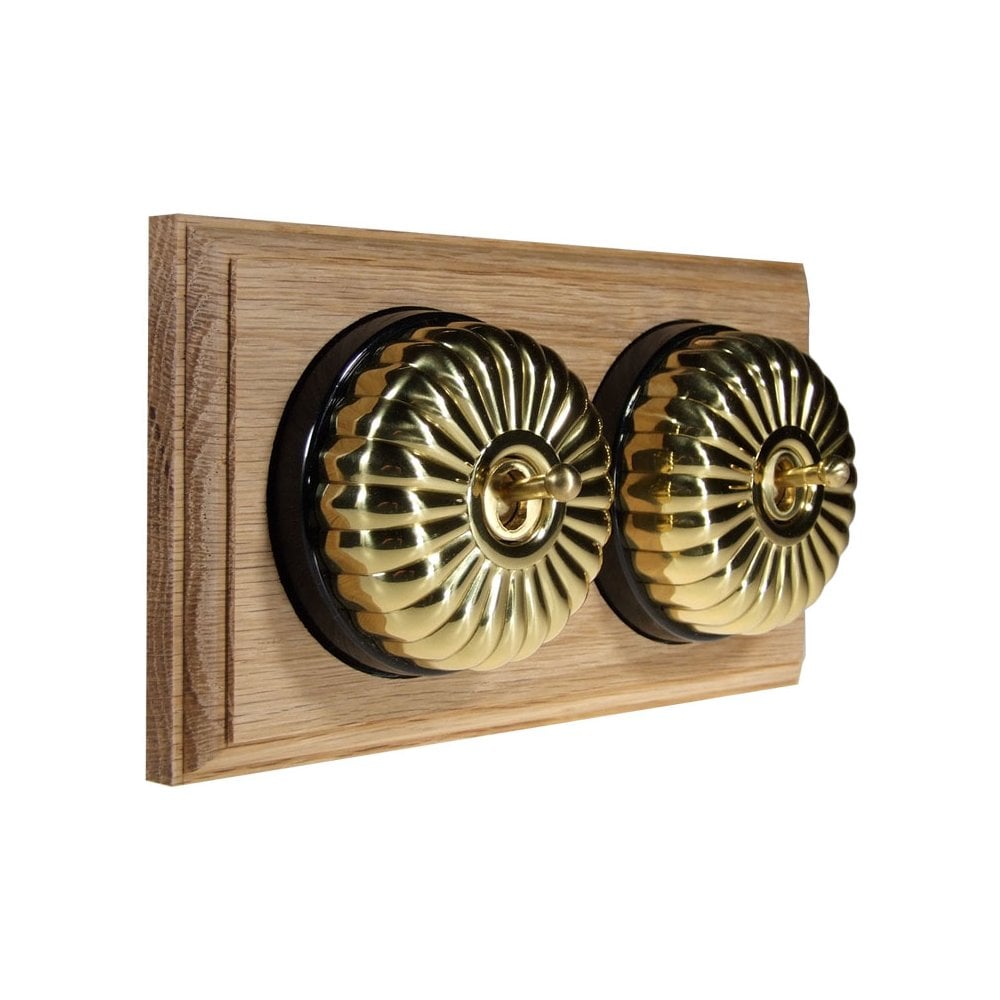 Switch to Wood's Dolly Light Switch Fluted Dome - 2 Gang Horizontal Polished Brass in Unfinished Oak