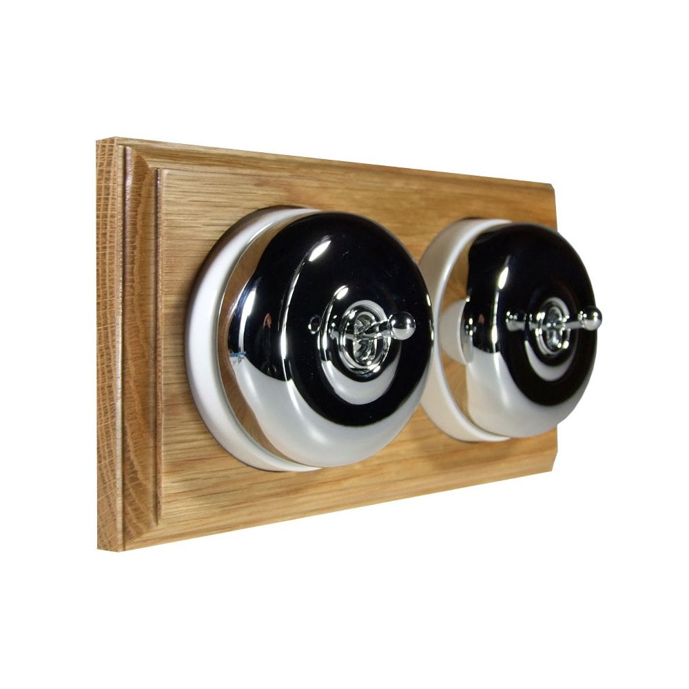 Switch to Wood's Dolly Light Switch Smooth Dome - 2 Gang Horizontal Polished Chrome in Light Oak