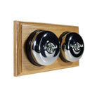 Switch to Wood's Dolly Light Switch Smooth Dome - 2 Gang Horizontal Polished Chrome in Light Oak