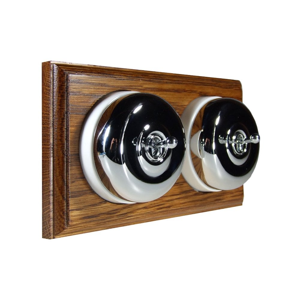 Switch to Wood's Dolly Light Switch Smooth Dome - 2 Gang Horizontal Polished Chrome in Medium Oak 