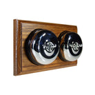 Switch to Wood's Dolly Light Switch Smooth Dome - 2 Gang Horizontal Polished Chrome in Medium Oak 