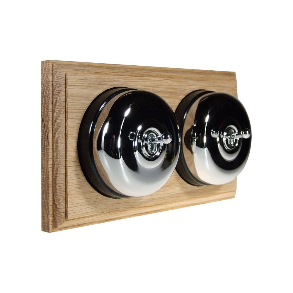 Switch to Wood's Dolly Light Switch Smooth Dome - 2 Gang Horizontal Polished Chrome in Unfinished Oak