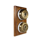 Switch to Wood's Dolly Light Switch Smooth Dome - 2 Gang Vertical Antique Brass in Medium Oak 