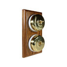 Switch to Wood's Dolly Light Switch Smooth Dome - 2 Gang Vertical Polished Brass in Medium Oak 