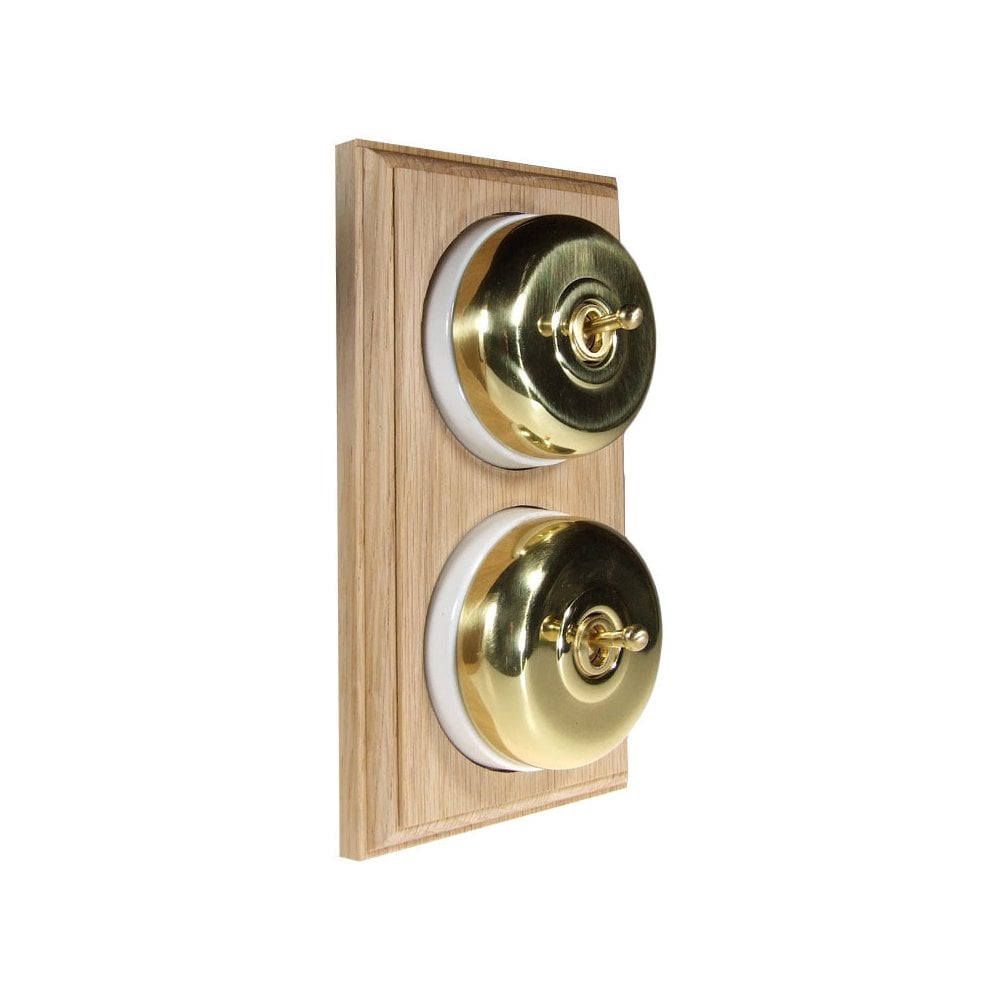 Switch to Wood's Dolly Light Switch Smooth Dome - 2 Gang Vertical Polished Brass in Unfinished Oak
