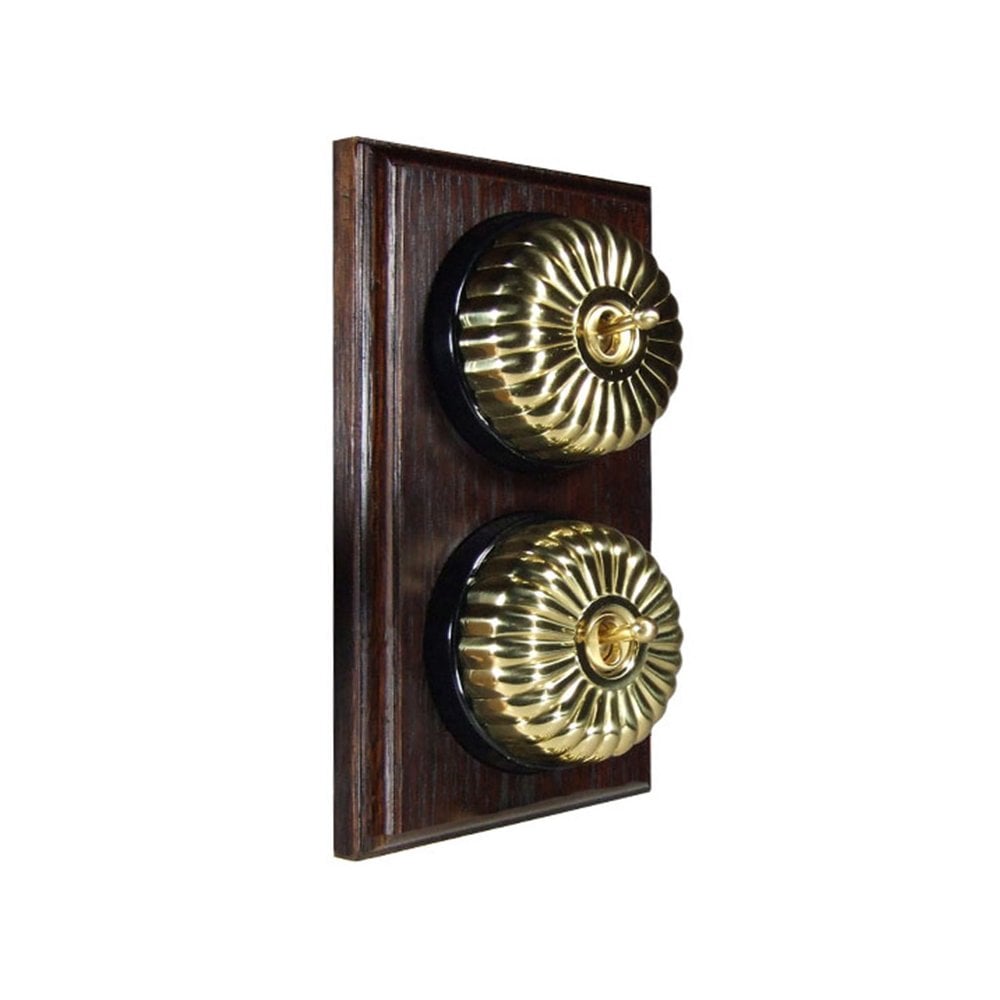 Switch to Wood's Dolly Light Switch Fluted Dome - 2 Gang Vertical Polished Brass in Dark Oak