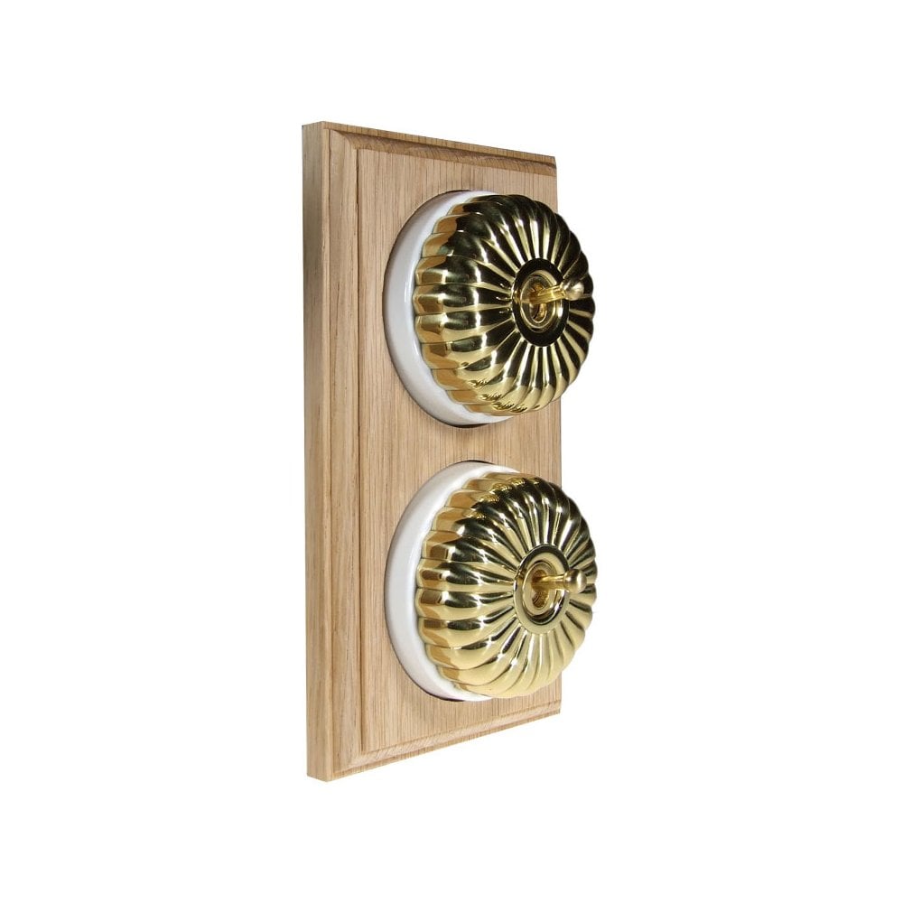 Switch to Wood's Dolly Light Switch Fluted Dome - 2 Gang Vertical Polished Brass in Unfinished Oak