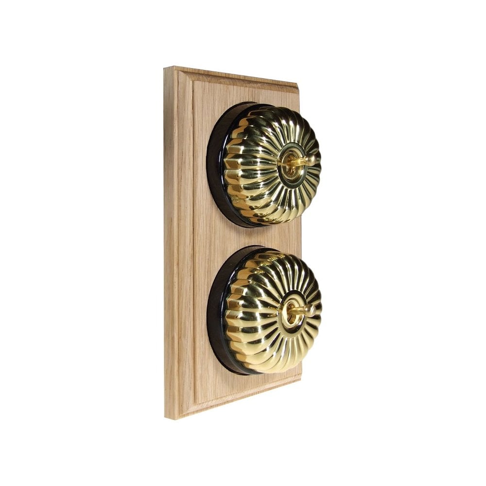 Switch to Wood's Dolly Light Switch Fluted Dome - 2 Gang Vertical Polished Brass in Unfinished Oak