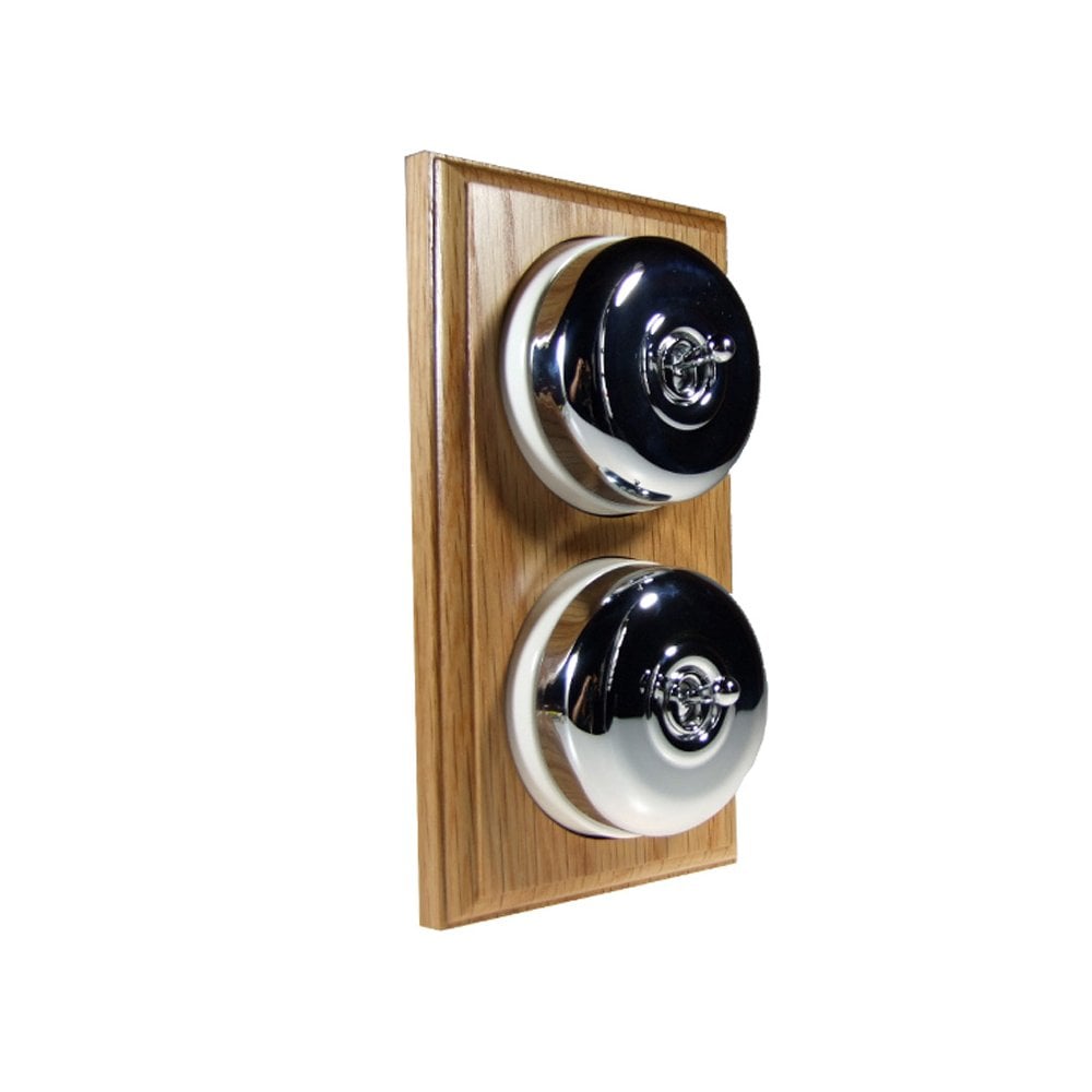 Switch to Wood's Dolly Light Switch Smooth Dome - 2 Gang Vertical Polished Chrome in Light Oak