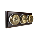 Switch to Wood's Dolly Light Switch Smooth Dome - 3 Gang Horizontal Antique Brass in Dark Oak