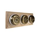 Switch to Wood's Dolly Light Switch Smooth Dome - 3 Gang Horizontal Antique Brass in Unfinished Oak
