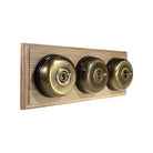 Switch to Wood's Dolly Light Switch Smooth Dome - 3 Gang Horizontal Antique Brass in Unfinished Oak