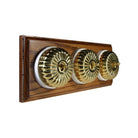 Switch to Wood's Dolly Light Switch Fluted Dome - 3 Gang Horizontal Polished Brass in Medium Oak 