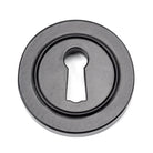 From The Anvil's Black Round Escutcheon