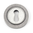 From The Anvil's Pewter Patina Round Escutcheon