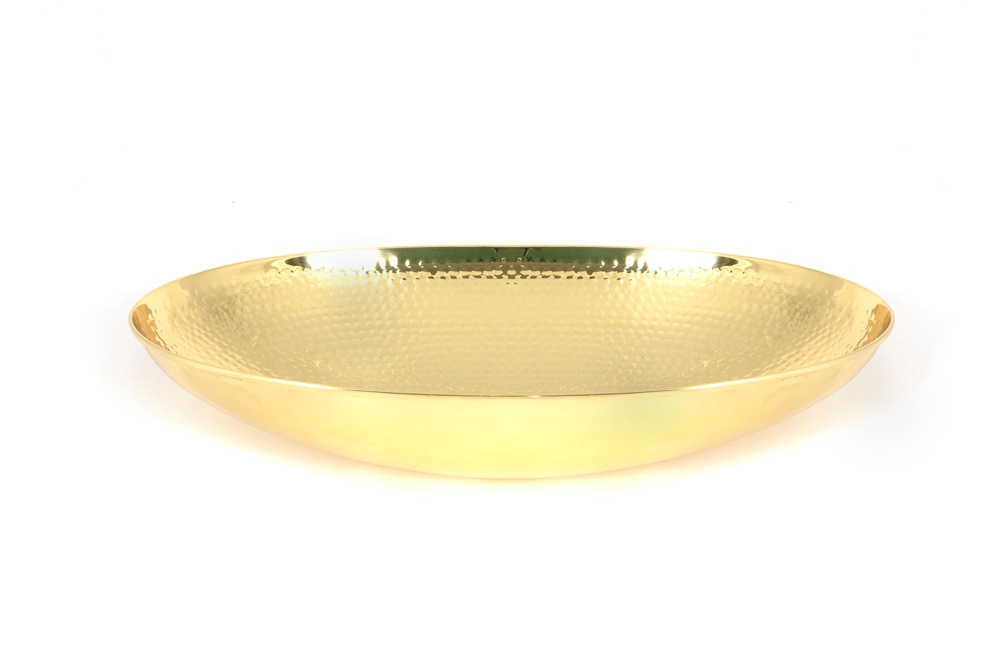 From The Anvil's Hammered Brass Oval basin