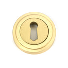 From The Anvil's Satin Brass Round Escutcheon
