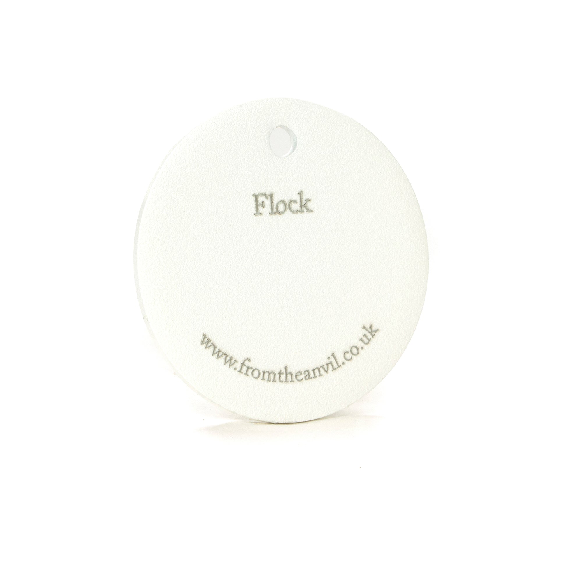 White background image of From The Anvil's Flock finish swatch