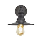 Industrial-style pendant light with a brushed pewter exterior, hanging from a black cord.