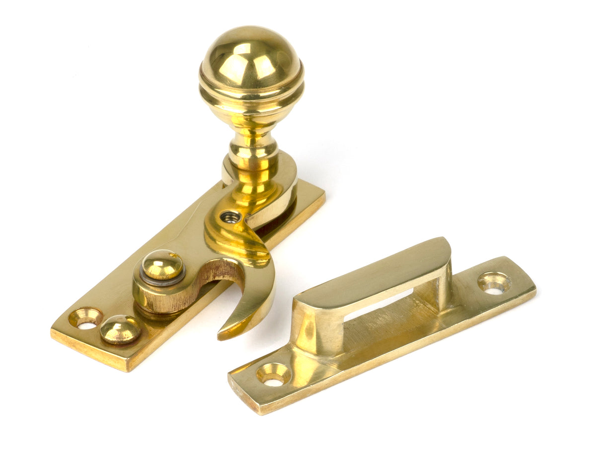 From The Anvil's Polished Brass Prestbury Sash Hook Fastener