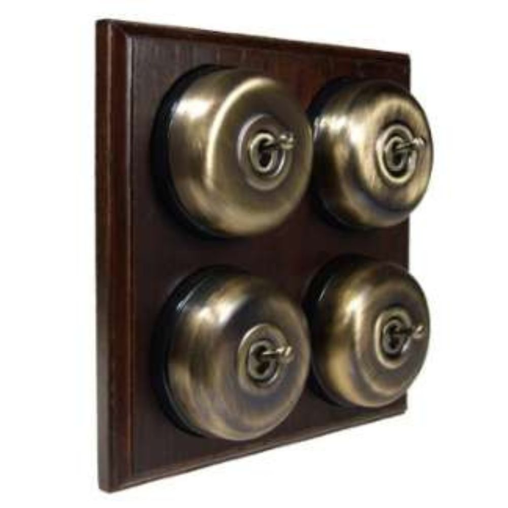 Switch to Wood's Dolly Light Switch Smooth Dome - 4 Gang Horizontal Antique Brass in Dark Oak