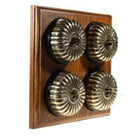 Switch to Wood's Dolly Light Switch Fluted Dome - 4 Gang Horizontal Antique Brass in Medium Oak 