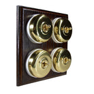 Switch to Wood's Dolly Light Switch Smooth Dome - 4 Gang Horizontal Polished Brass in Dark Oak